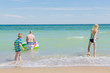 © Konstiantyn Zap - Dad, daughter and son enter the sea.