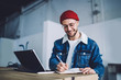 © BullRun - Confident young man taking notes at office