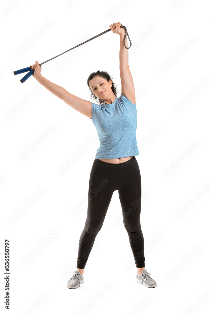 Sporty young woman training against white background