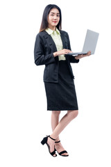 Wall Mural - Asian businesswoman standing while using laptop