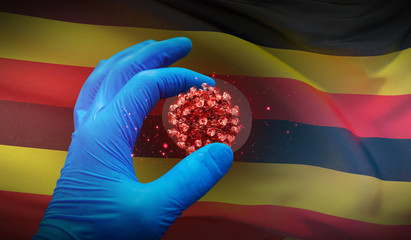 A hand in a medical glove holds a molecule, medical science concept, on background flag of Uganda. 3D illustration.