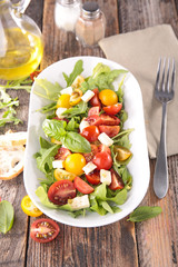 Sticker - tomato salad with mozzarella and lettuce