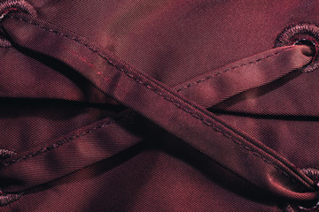 Aufkleber - Close up beautiful red textile cloth background with stitching. Macro photography background material view.