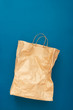 Crumpled Paper bag on a blue background