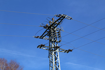 Transmission line on background of blue sky