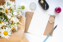 Card Mockup With Daisies And Envelope. Wedding Invitation In Minimalist Style With Leaves
