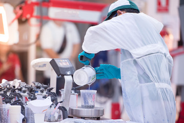 Preparation of paint for car paint in the laboratory, the car paint shop in the factory, and the training of craftsmen in color mixing.