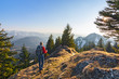 © Andreas Föll - Man with backpack hiking in the mountains at sunset. Allgau Alps, Bavaria, Germany