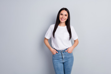 Sticker - Portrait of her she nice attractive lovely pretty charming cute content cheerful cheery straight-haired girl holding hands in pockets isolated over light grey pastel color background