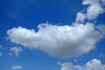 Wall Mural - white cloud with blue sky background.