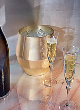 Champagne Served In Champagne Flutes On Table