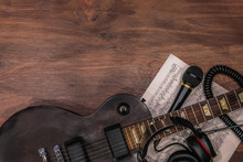 Guitar And Headphones, Notes And Microphone On A Wooden Background, Electric Guitar, Compose Music, Flat Lay