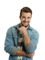 Young man cassually dressed smiing  with hand on his chin