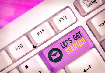 Wall Mural - writing note showing let get started. business concept for encouraging someone to begin doing someth