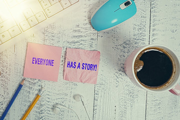 Poster - Handwriting text Everyone Has A Story. Conceptual photo account of past events in someones life or career technological devices colored reminder paper office supplies keyboard mouse