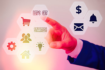 Wall Mural - writing note showing let get started. business concept for encouraging someone to begin doing someth