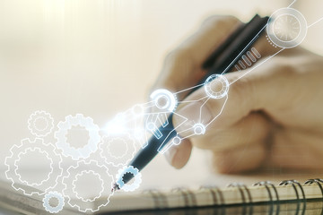 Poster - Double exposure of robotics technology hologram and woman hand writing in notebook on background. Research and development software concept