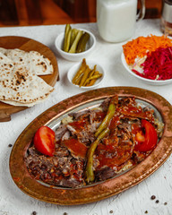 Canvas Print - a platter of beef kebab topped with tomato sauce