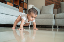 Baby Learn To Crawl On The Floor At Home