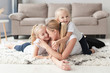 © FreepikCompany - Happy mother and daughters posing at home