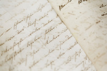 Closeup Of Old Handwriting; Vintage Paper Background