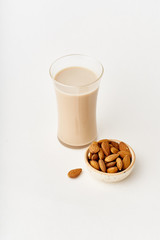 Wall Mural - A glass of almond milk. Healthy protein drink suitale for vegans. Dairy alternative