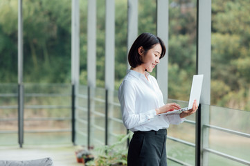 Wall Mural - Young Asian business woman