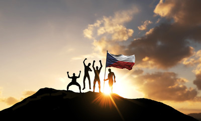 Wall Mural - Group of people celebrate on a mountain top with Czech Republic flag. 3D Render