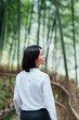 Young Asian women in bamboo forest