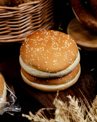 burger buns with sesame on top