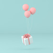minimal conceptual idea of present box floating by balloons on pastel background. 3D rendering 
