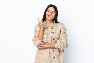 Wall Mural - Young latin woman woman isolated on white background pointing up a great idea