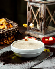 Canvas Print - mushroom soup and crackers dropped into it