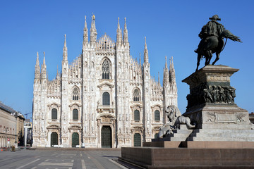 Wall Mural - Milan, Italy - March 2020: empty square in Duomo cathedral downtown and Vittorio Emanuele gallery during   n-cov19 coronavirus quarantine. Pandemic. City of the desert. Piazza Duomo Empty streets