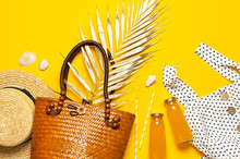 Beach Wicker Straw Rattan Women's Eco Bag White Dress Hat Golden Tropical Leaf Juice In Glass Jars Straws Shells Starfish On Yellow Background. Flat Lay Top View. Summer Background Beach Accessories