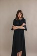 © Liliya Rodnikova/Stocksy - Emotionless model in dark dress