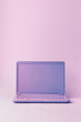 © Ruth Black/Stocksy - Purple laptop