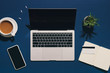 © Maki Company Limited/Stocksy - Office stuff with laptop, cup of coffee, credit card and smart phone