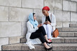 © Ivan Gener/Stocksy - Muslim females social media.