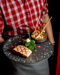 Poster - grilled salmon fillet served with vegetables salad