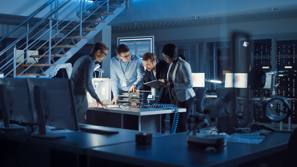 Fototapete - Team of Electronics Development Engineers Standing at the Desk with 3D Printer and PCB Motherboards. Specialists Working on Ultra Modern Industrial Design, Using Advanced Technology.