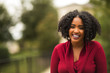 © digitalskillet1 - Beautiful Confident African American Woman Smiling Outside