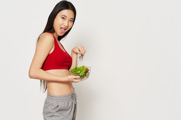 Wall Mural - young woman with salad