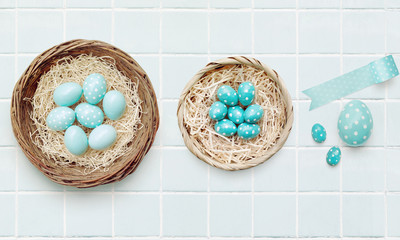 Easter background with Easter eggs in a nest.