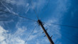 Low Angle View Of Telephone Line Against Sky
