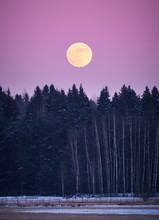 Scenic View Of Full Moon Against Purple Sky