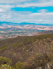 Wall Mural - Panoramic view of mountains on blue sky