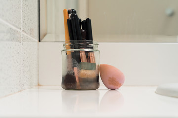 soaking brushes in a soapy water solution before cleaning