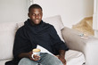 © SHOTPRIME STUDIO - male african appearance laptop house