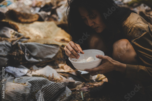 Fotomural poor people or beggar begging you for help sitting at dirty slum